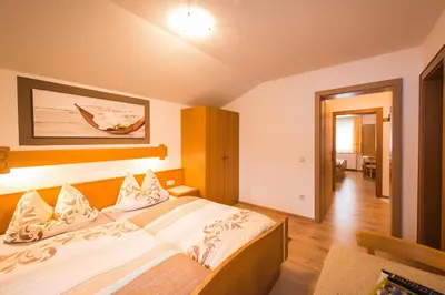 Ein Bett oder Betten in einem Zimmer der Unterkunft Hotel Pension Barbara