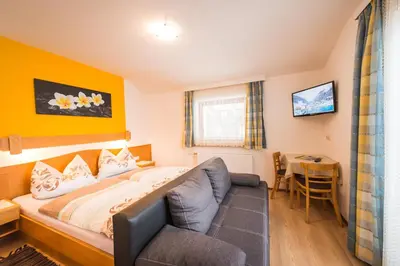 Ein Bett oder Betten in einem Zimmer der Unterkunft Hotel Pension Barbara