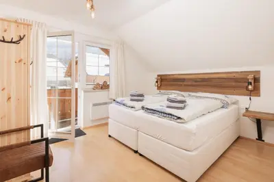 Ein Bett oder Betten in einem Zimmer der Unterkunft Pistenblick Chalet