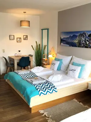 Ein Bett oder Betten in einem Zimmer der Unterkunft Apartment Goisernperle