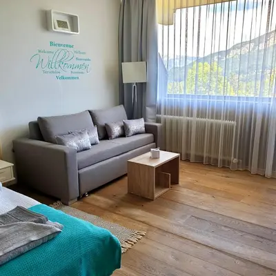 Ein Sitzbereich in der Unterkunft Apartment Goisernperle