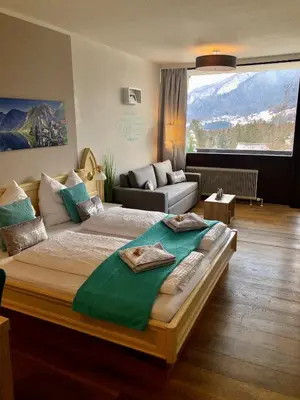 Ein Bett oder Betten in einem Zimmer der Unterkunft Apartment Goisernperle