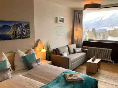Ein Bett oder Betten in einem Zimmer der Unterkunft Apartment Goisernperle