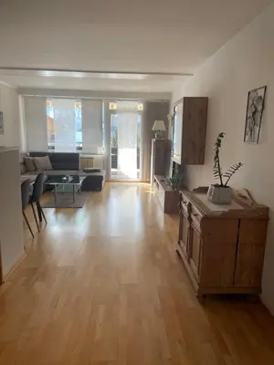 Ein Sitzbereich in der Unterkunft Apartment Dachsteinblick