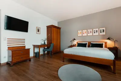 Ein Bett oder Betten in einem Zimmer der Unterkunft Hotel Esplanade