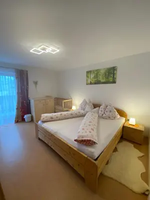 Ein Bett oder Betten in einem Zimmer der Unterkunft Nussbaumer am Irrsee