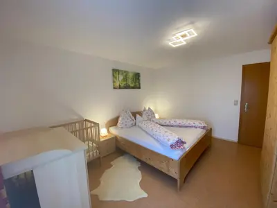 Ein Bett oder Betten in einem Zimmer der Unterkunft Nussbaumer am Irrsee