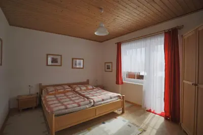 Ein Bett oder Betten in einem Zimmer der Unterkunft Ferienwohnungen Matzner