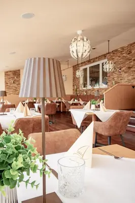 Ein Sitzbereich in der Unterkunft Hotel Attersee