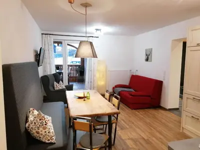 Ein Sitzbereich in der Unterkunft Tauerncamping Apartment