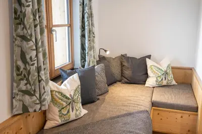 Ein Sitzbereich in der Unterkunft Tauerncamping Apartment
