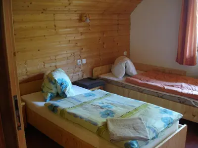 Ein Bett oder Betten in einem Zimmer der Unterkunft Pension Stoder