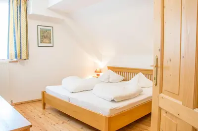 Ein Bett oder Betten in einem Zimmer der Unterkunft Appartement Schizentrum Grosseck - Speiereck