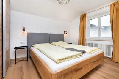 Ein Bett oder Betten in einem Zimmer der Unterkunft Chalet Sonnrain