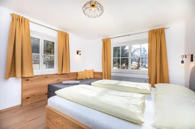 Ein Bett oder Betten in einem Zimmer der Unterkunft Chalet Sonnrain