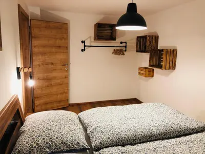 Ein Bett oder Betten in einem Zimmer der Unterkunft Pernerhof