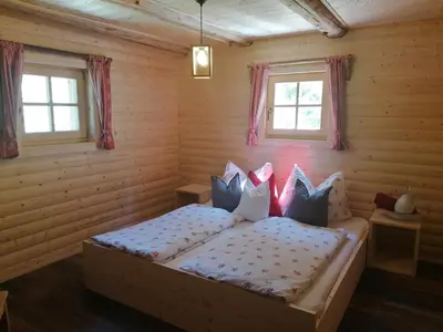 Ein Bett oder Betten in einem Zimmer der Unterkunft Ampferkaralm Hütte