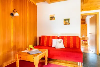 Ein Sitzbereich in der Unterkunft Öko-Appartements Fallhaus