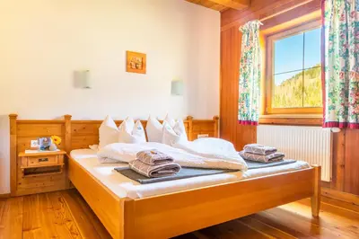 Ein Bett oder Betten in einem Zimmer der Unterkunft Öko-Appartements Fallhaus