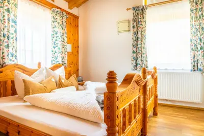 Ein Bett oder Betten in einem Zimmer der Unterkunft Öko-Appartements Fallhaus