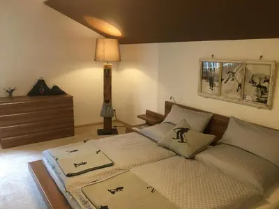 Ein Bett oder Betten in einem Zimmer der Unterkunft Appartementhaus Finis