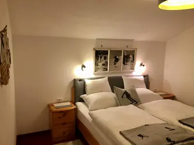 Ein Bett oder Betten in einem Zimmer der Unterkunft Appartementhaus Finis