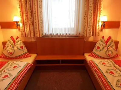 Ein Bett oder Betten in einem Zimmer der Unterkunft Fewo Weissenbacher Katschberg