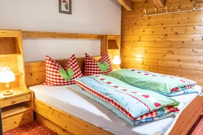 Ein Bett oder Betten in einem Zimmer der Unterkunft Fewo Weissenbacher Katschberg