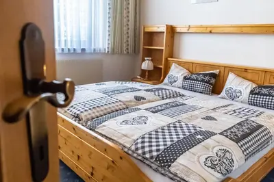Ein Bett oder Betten in einem Zimmer der Unterkunft Fewo Weissenbacher Katschberg