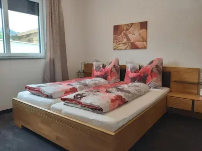 Ein Bett oder Betten in einem Zimmer der Unterkunft Buchbergdomizil