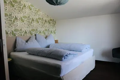 Ein Bett oder Betten in einem Zimmer der Unterkunft Apart-Pension Seiwald