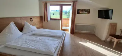 Ein Bett oder Betten in einem Zimmer der Unterkunft Pension Stammerhof