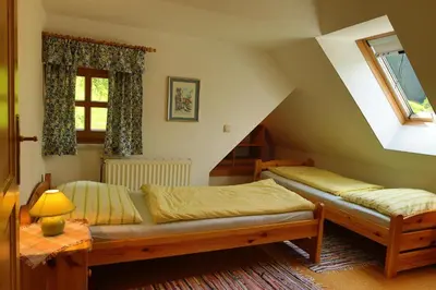 Ein Bett oder Betten in einem Zimmer der Unterkunft Gästehof Annerl