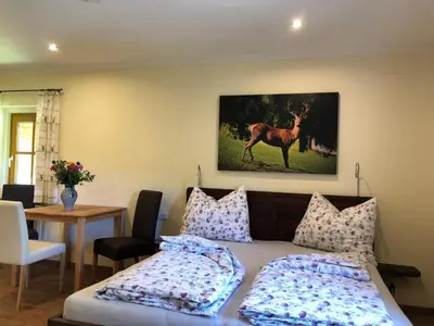 Ein Bett oder Betten in einem Zimmer der Unterkunft Gästehof Annerl