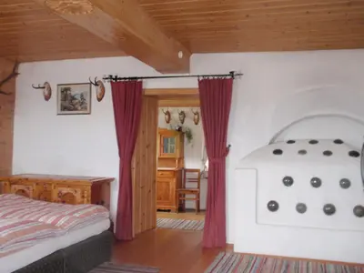 Ein Bett oder Betten in einem Zimmer der Unterkunft Ferienwohnung am Rettlhof