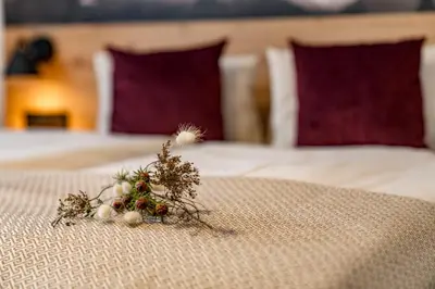 Ein Bett oder Betten in einem Zimmer der Unterkunft Hotel Hierzegger