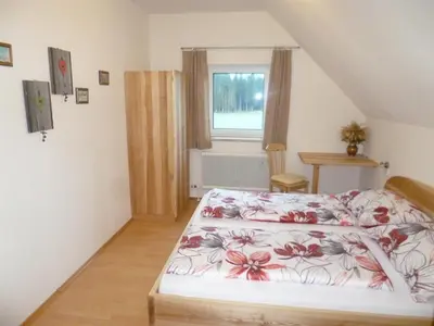 Ein Bett oder Betten in einem Zimmer der Unterkunft Gausrab
