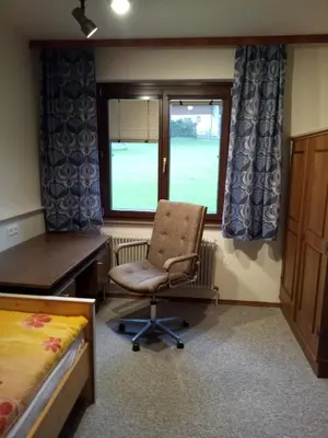 Ein Sitzbereich in der Unterkunft Ferienhaus Raumberg