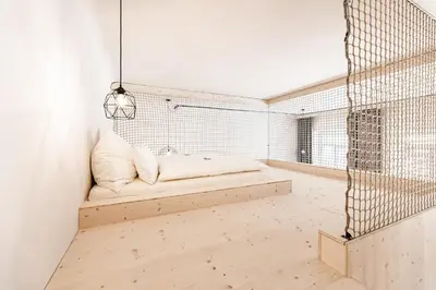 Ein Bett oder Betten in einem Zimmer der Unterkunft NaturparkResort Alte Schule