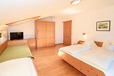 Ein Bett oder Betten in einem Zimmer der Unterkunft Urlpoldhof