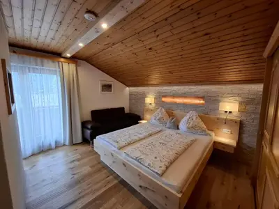 Ein Bett oder Betten in einem Zimmer der Unterkunft Wagnerhof