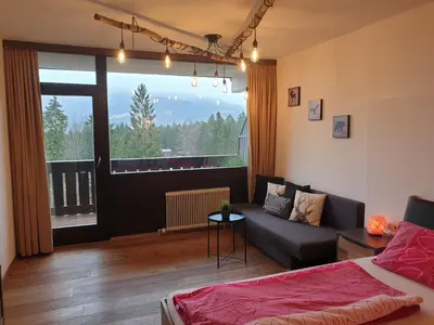 Ein Sitzbereich in der Unterkunft Apartment Noemi