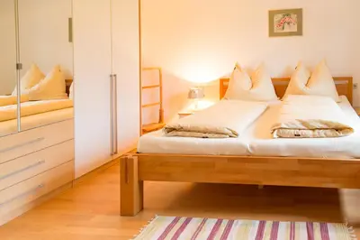 Ein Bett oder Betten in einem Zimmer der Unterkunft Strauss Appartements