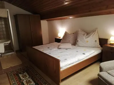 Ein Bett oder Betten in einem Zimmer der Unterkunft Am Mondseeblick