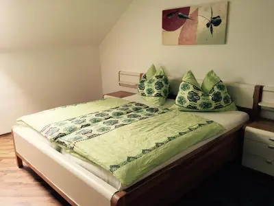 Ein Bett oder Betten in einem Zimmer der Unterkunft Das Ferienhaus