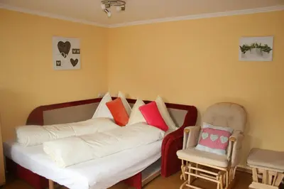 Ein Bett oder Betten in einem Zimmer der Unterkunft Haus Bergliebe