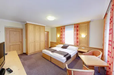 Ein Bett oder Betten in einem Zimmer der Unterkunft Hotel Magerl