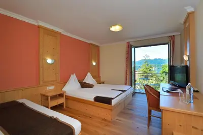 Ein Bett oder Betten in einem Zimmer der Unterkunft Hotel Magerl