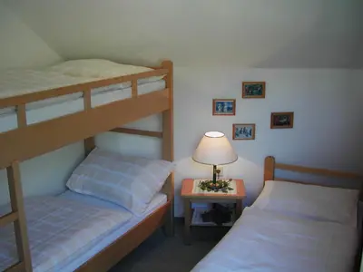 Ein Bett oder Betten in einem Zimmer der Unterkunft Ferienwohnung 11 Planneralm