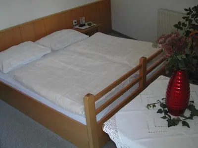 Ein Bett oder Betten in einem Zimmer der Unterkunft Ferienwohnung 11 Planneralm